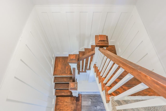 stairway featuring hardwood / wood-style flooring