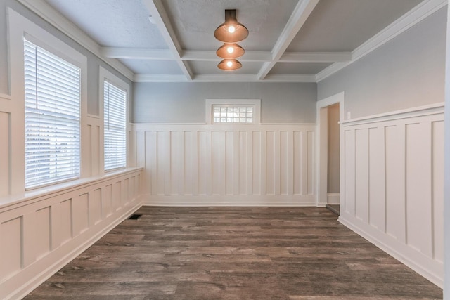 unfurnished room with beamed ceiling, crown molding, dark wood-type flooring, and coffered ceiling