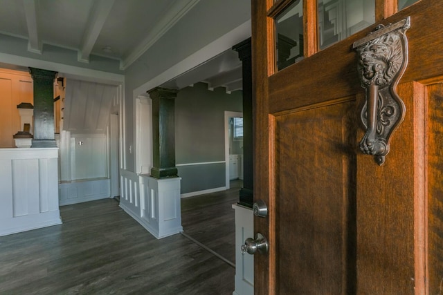 hall with beamed ceiling, dark hardwood / wood-style flooring, and ornamental molding