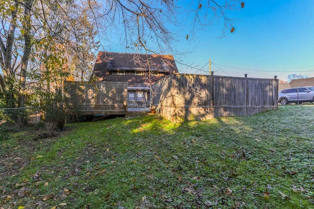 view of yard with a deck