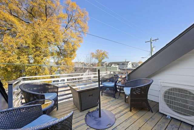 wooden terrace with ac unit