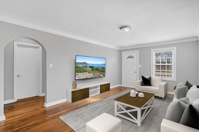 living room with crown molding and dark hardwood / wood-style floors