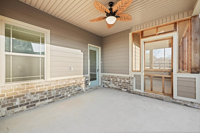 view of patio featuring a ceiling fan