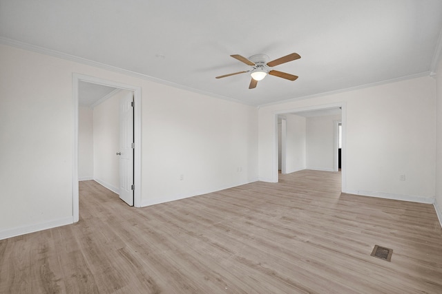 unfurnished room with crown molding, ceiling fan, and light hardwood / wood-style floors