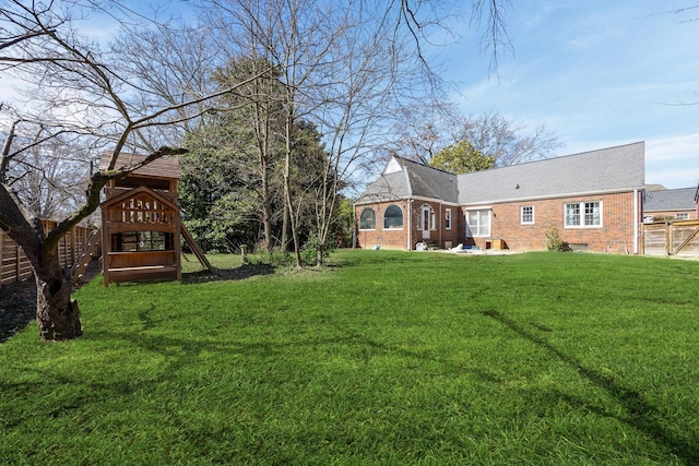 view of yard featuring fence