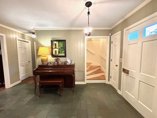 miscellaneous room with crown molding