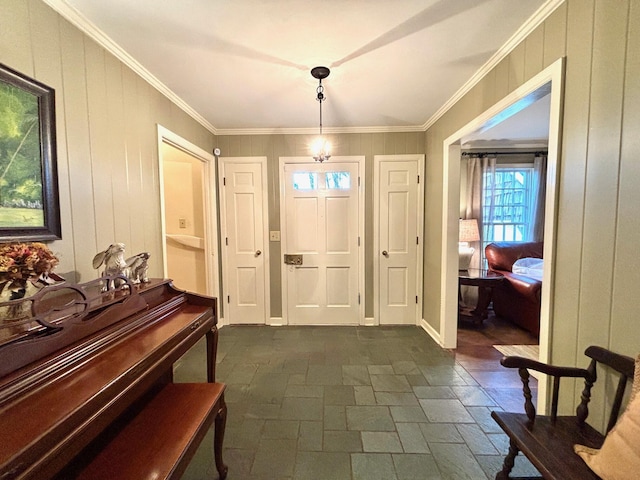 foyer featuring crown molding