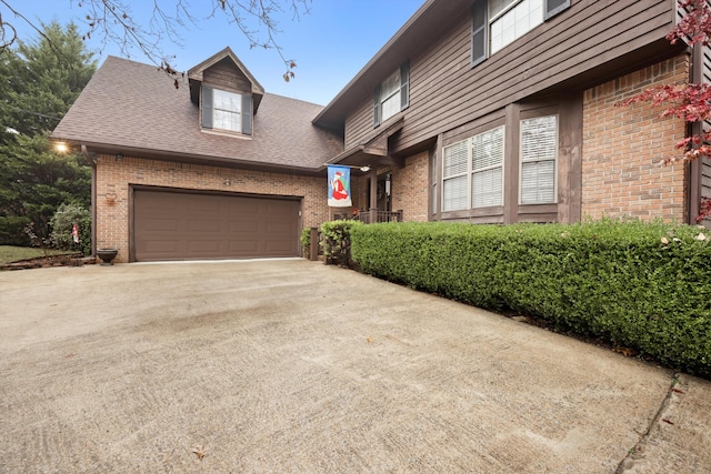 view of front of property featuring a garage