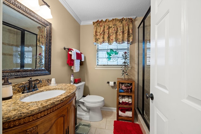 bathroom featuring vanity, a textured ceiling, a shower with door, crown molding, and tile patterned flooring