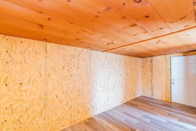 bonus room featuring hardwood / wood-style floors and wood ceiling