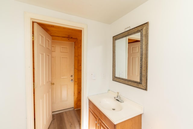 bathroom with wood-type flooring and vanity