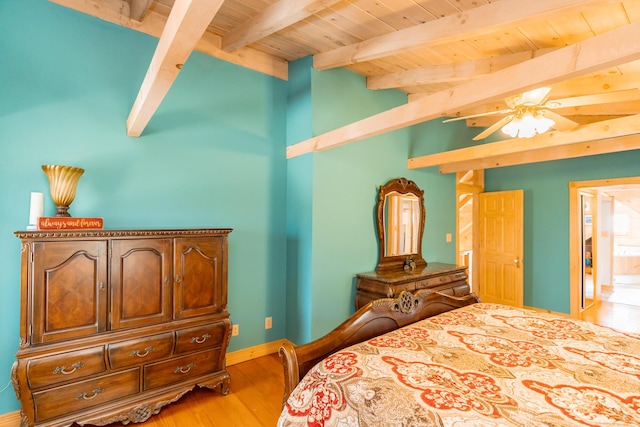 bedroom featuring wood ceiling, baseboards, lofted ceiling with beams, and light wood-style floors