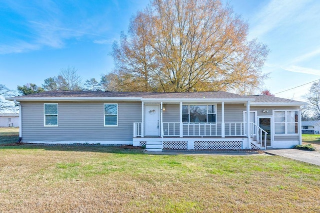 view of front of house featuring a porch and a front lawn