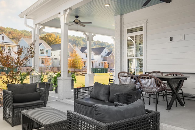 view of patio with outdoor lounge area and ceiling fan