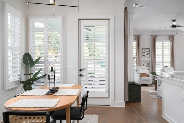 dining room featuring hardwood / wood-style floors and plenty of natural light