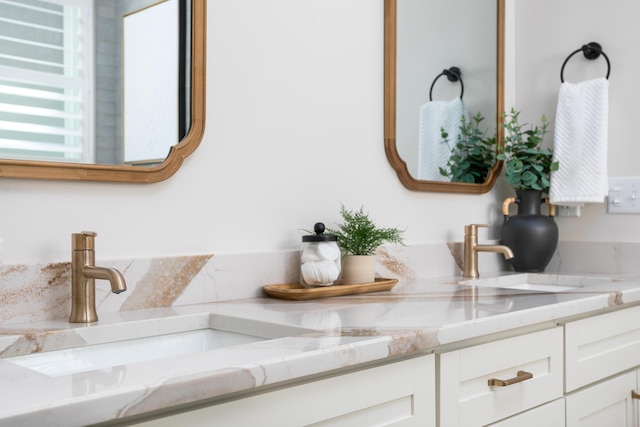 bathroom with radiator heating unit and vanity