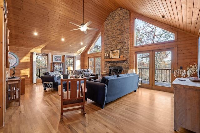 living room with high vaulted ceiling, wooden ceiling, and light wood-type flooring