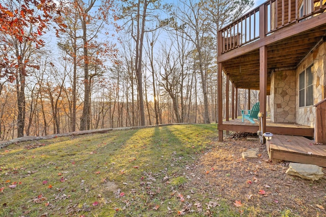 view of yard with a wooden deck