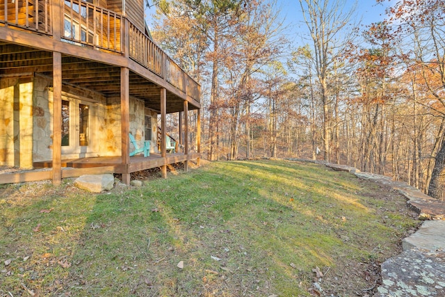 view of yard with a wooden deck