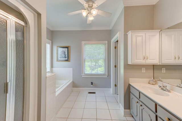 bathroom with ornamental molding, vanity, ceiling fan, tile patterned flooring, and tiled bath