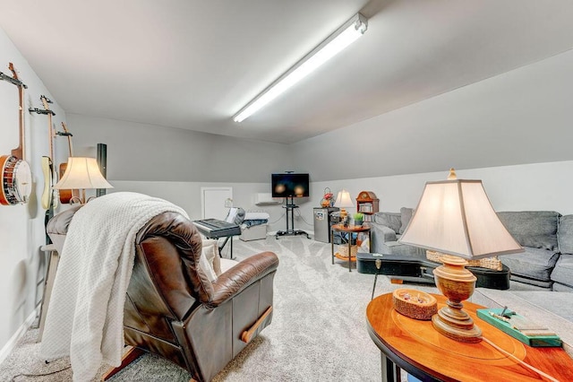 carpeted living room with vaulted ceiling