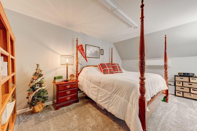 carpeted bedroom with vaulted ceiling