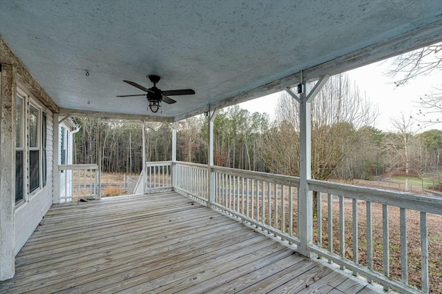 wooden terrace with ceiling fan