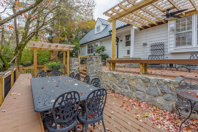 wooden deck featuring a pergola and ceiling fan