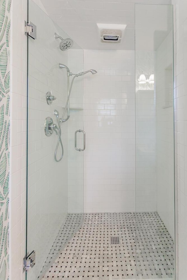 bathroom with an enclosed shower