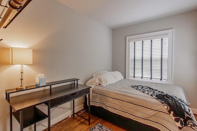 bedroom featuring hardwood / wood-style flooring