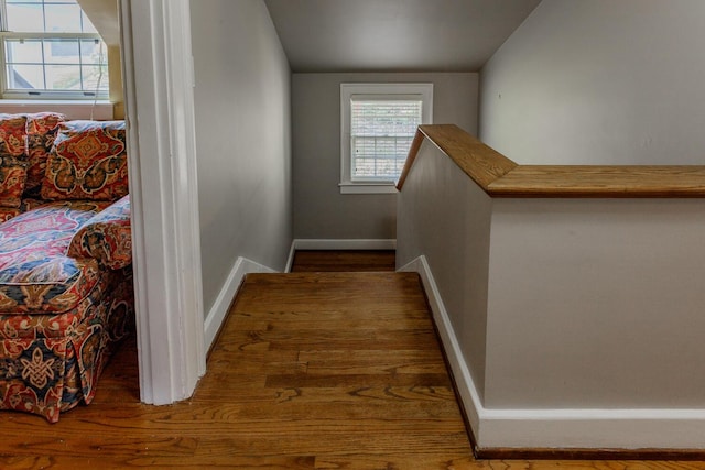 staircase with vaulted ceiling