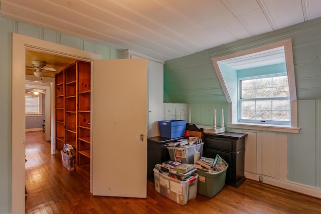 bonus room featuring ceiling fan, lofted ceiling, and hardwood / wood-style flooring