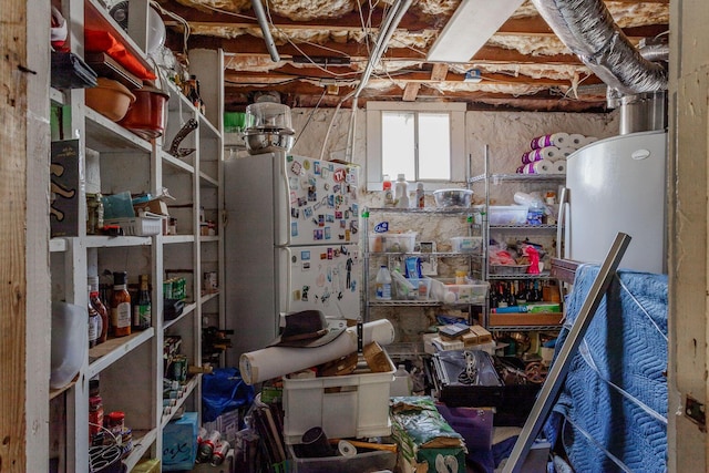 basement with white refrigerator