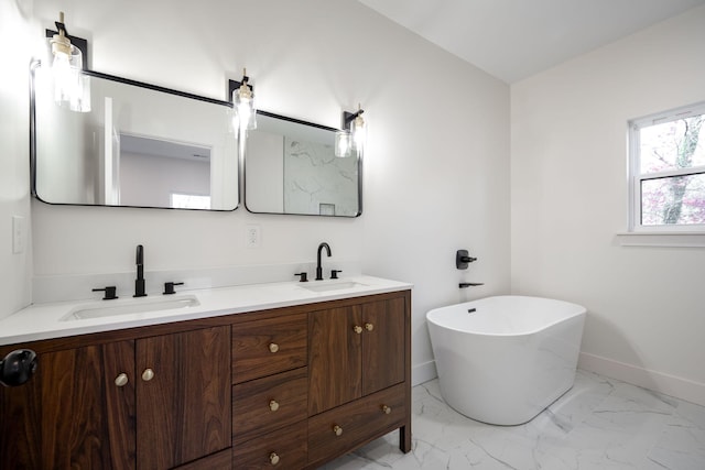 bathroom featuring vanity and a tub to relax in