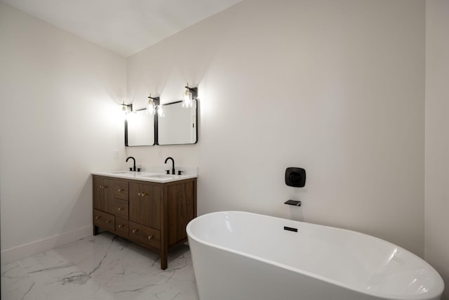 bathroom featuring vanity and a tub to relax in