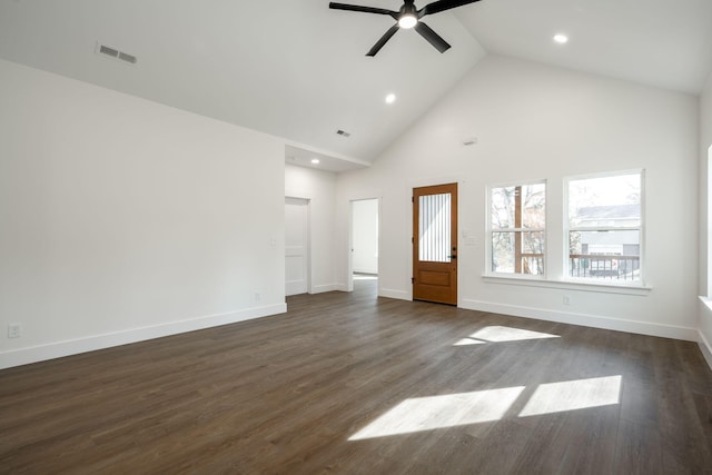 unfurnished living room featuring high vaulted ceiling, ceiling fan, and dark wood-type flooring