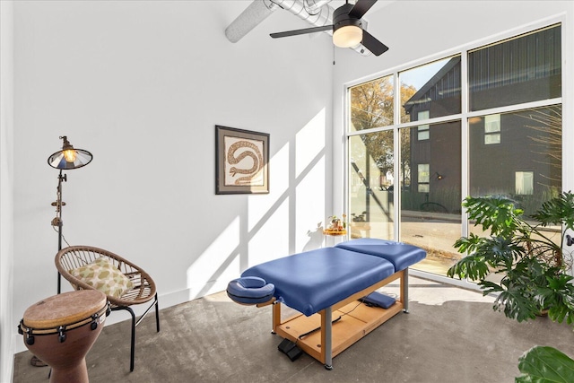 exercise area featuring ceiling fan