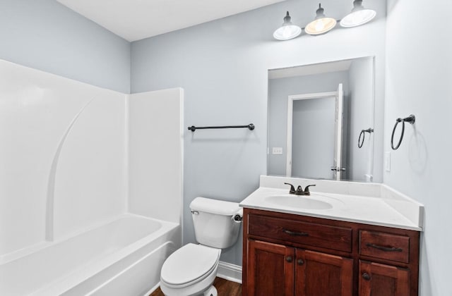 full bathroom with vanity, shower / bathtub combination, and toilet