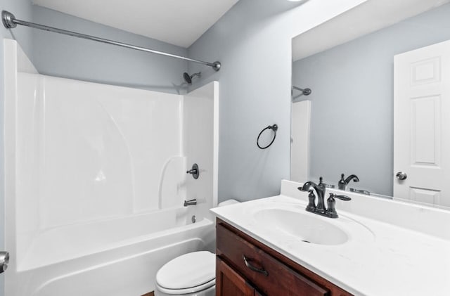 full bathroom featuring vanity, toilet, and shower / washtub combination