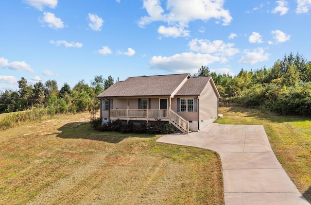 view of front facade with covered porch and a front yard