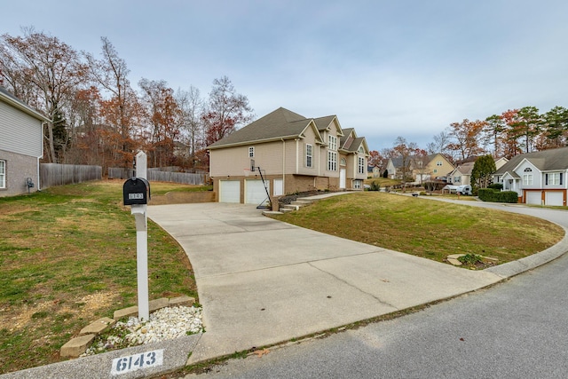 view of home's exterior featuring a lawn and a garage