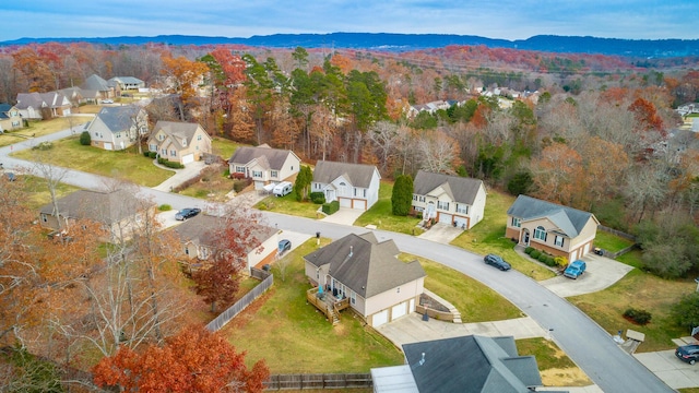 birds eye view of property featuring a mountain view