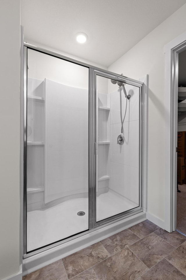 bathroom with an enclosed shower