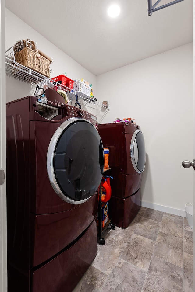 laundry room featuring separate washer and dryer