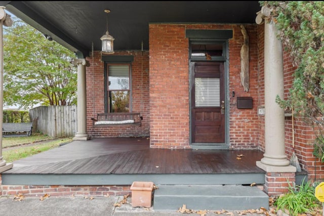 entrance to property with a porch