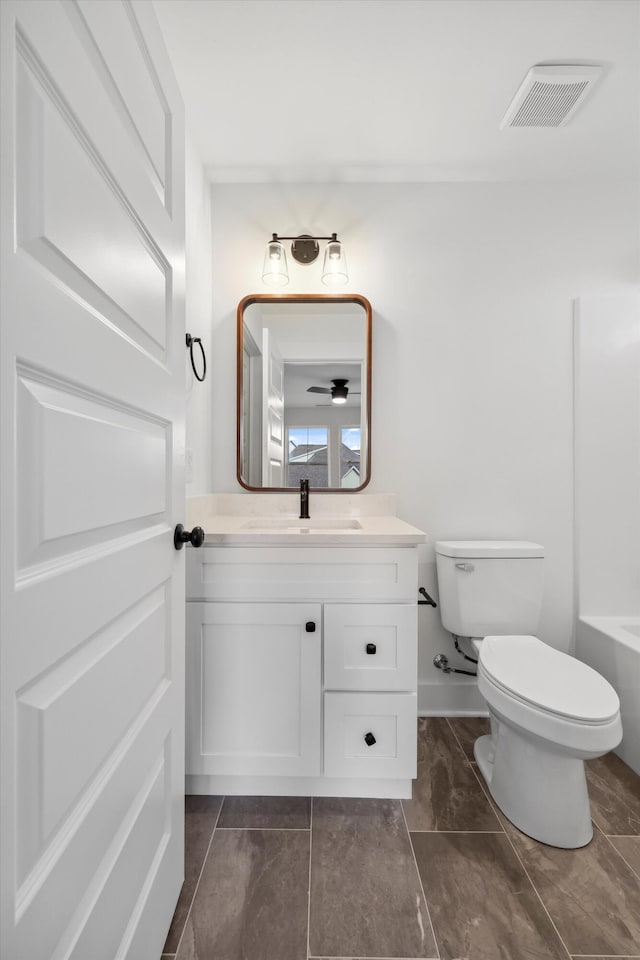 3511 Hawks Creek Dr, Apison, TN 37302 - full bathroom with a bath, visible vents, toilet, and vanity