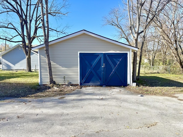 view of outbuilding with a garage