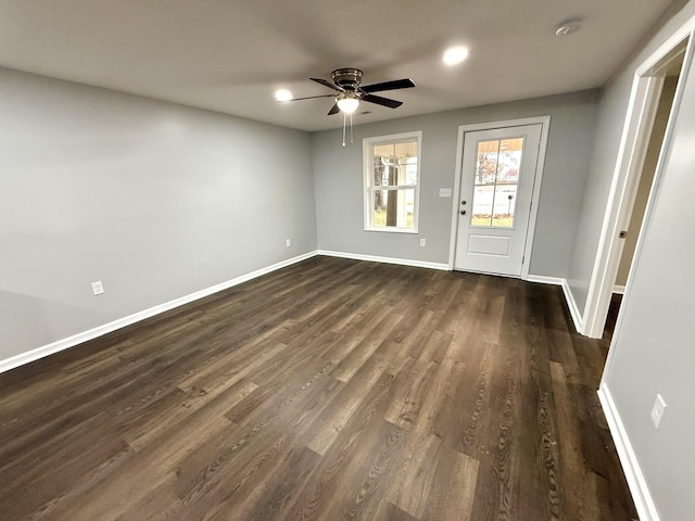 entrance foyer featuring dark hardwood / wood-style floors and ceiling fan