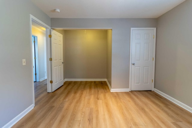 unfurnished bedroom with light hardwood / wood-style floors