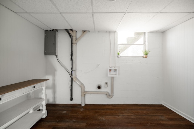 washroom featuring electric dryer hookup, electric panel, dark wood-type flooring, and hookup for a washing machine